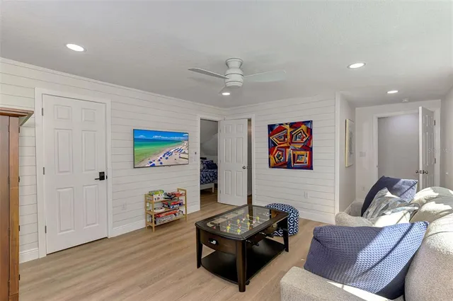 a bedroom with a bed and dresser