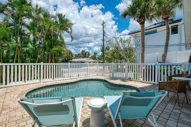 a sign board on the side of a road