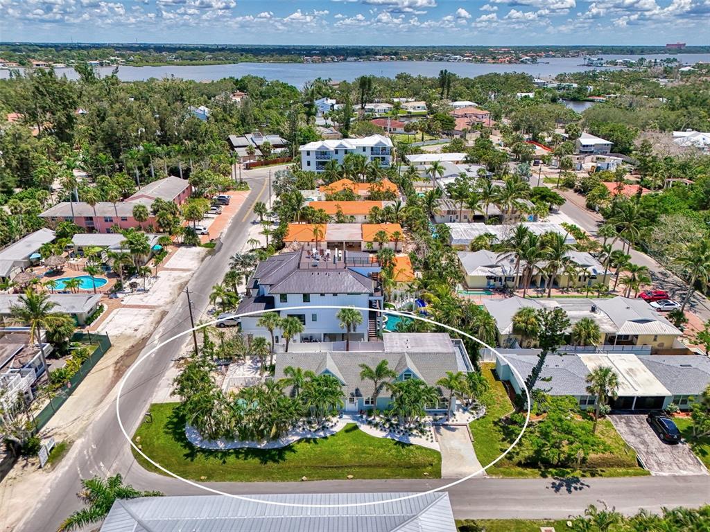1100 Point Of Rocks Road Sarasota, FL 34242 - Photo 46 of 53 an aerial view of residential houses with outdoor space and swimming pool