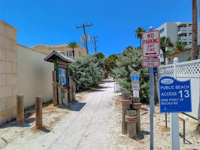 a view of a street with cars