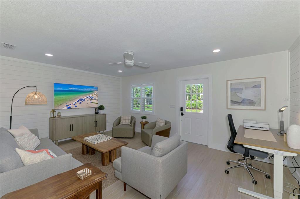 1100 Point Of Rocks Road Sarasota, FL 34242 - Photo 6 of 53 a living room with furniture and a window