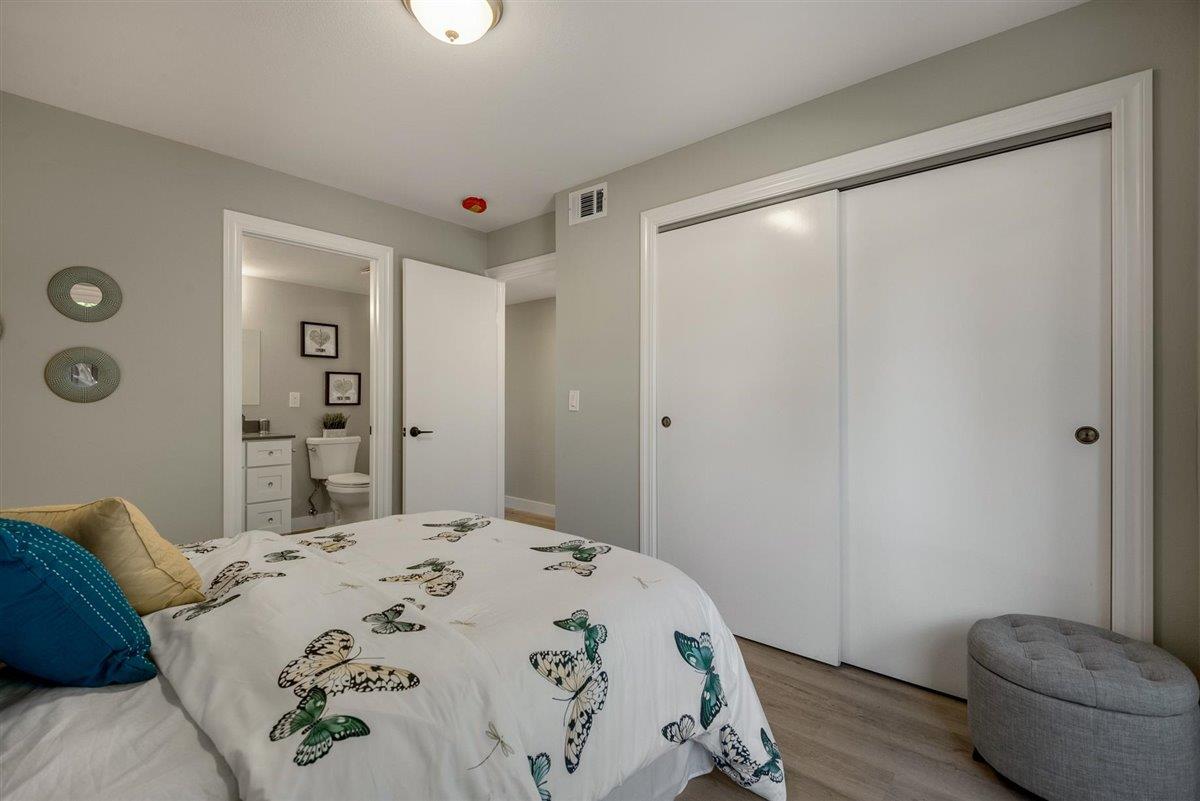 63 Redding Road Campbell, CA 95008 - Photo 22 of 28 a bedroom with a bed and a view of bathroom