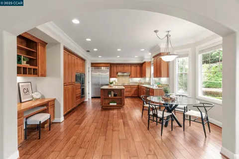 a kitchen with granite countertop a sink and a window