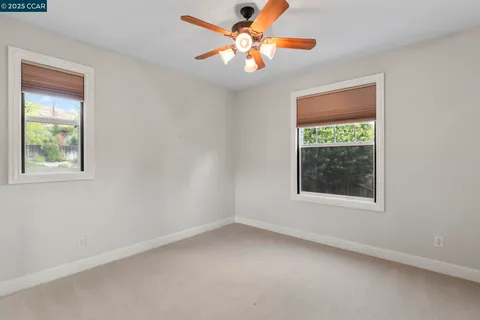 a view of a house with a yard porch and sitting area