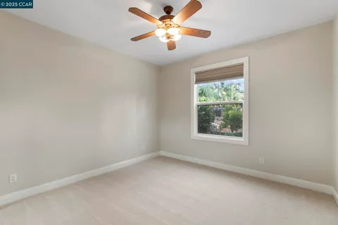 a view of a chairs and table in backyard