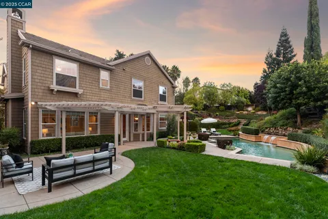 a view of backyard with green space