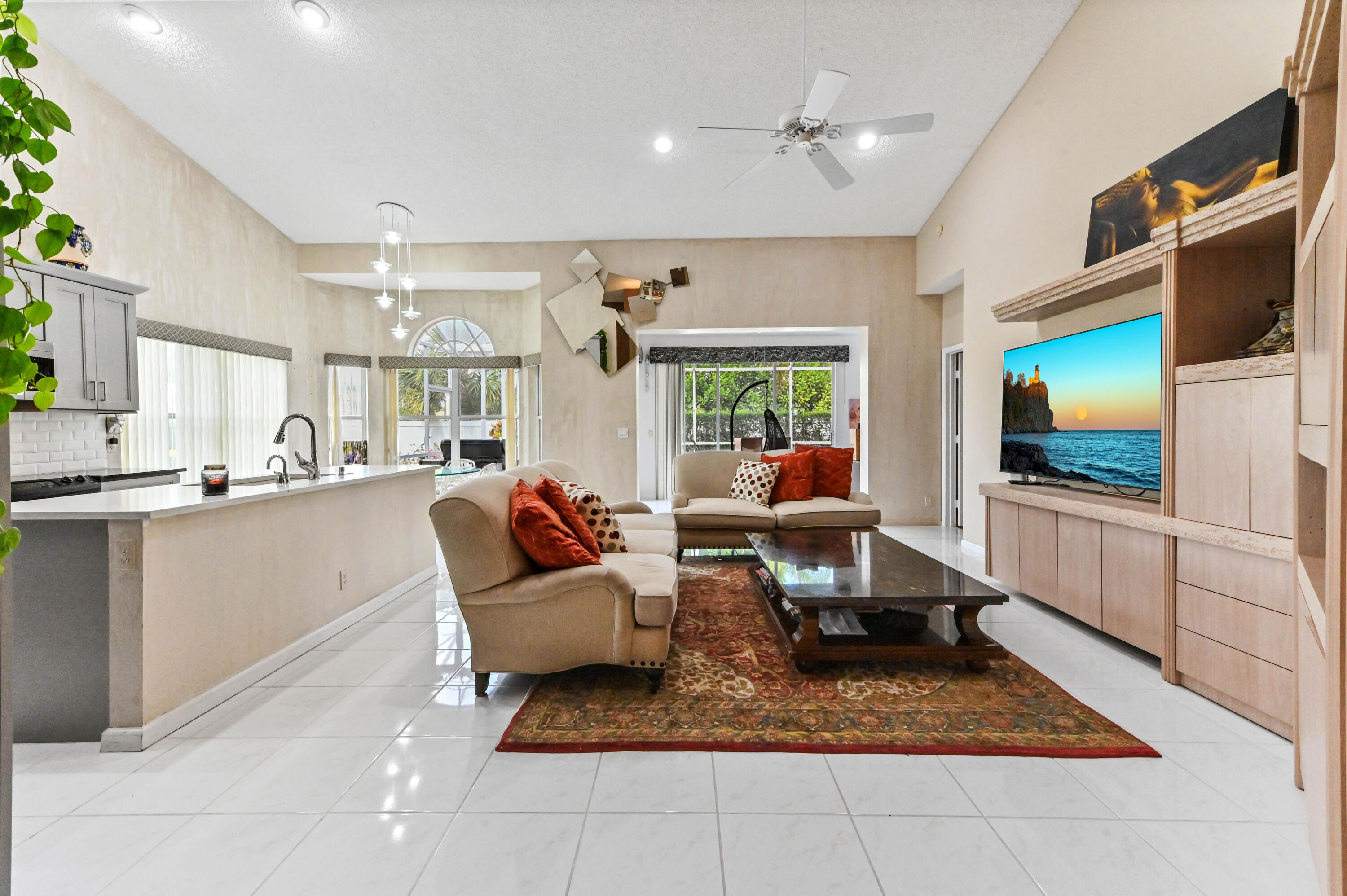 8319 Horseshoe Bay Road Boynton Beach, FL 33472 - Photo 11 of 69 a living room with furniture and a flat screen tv