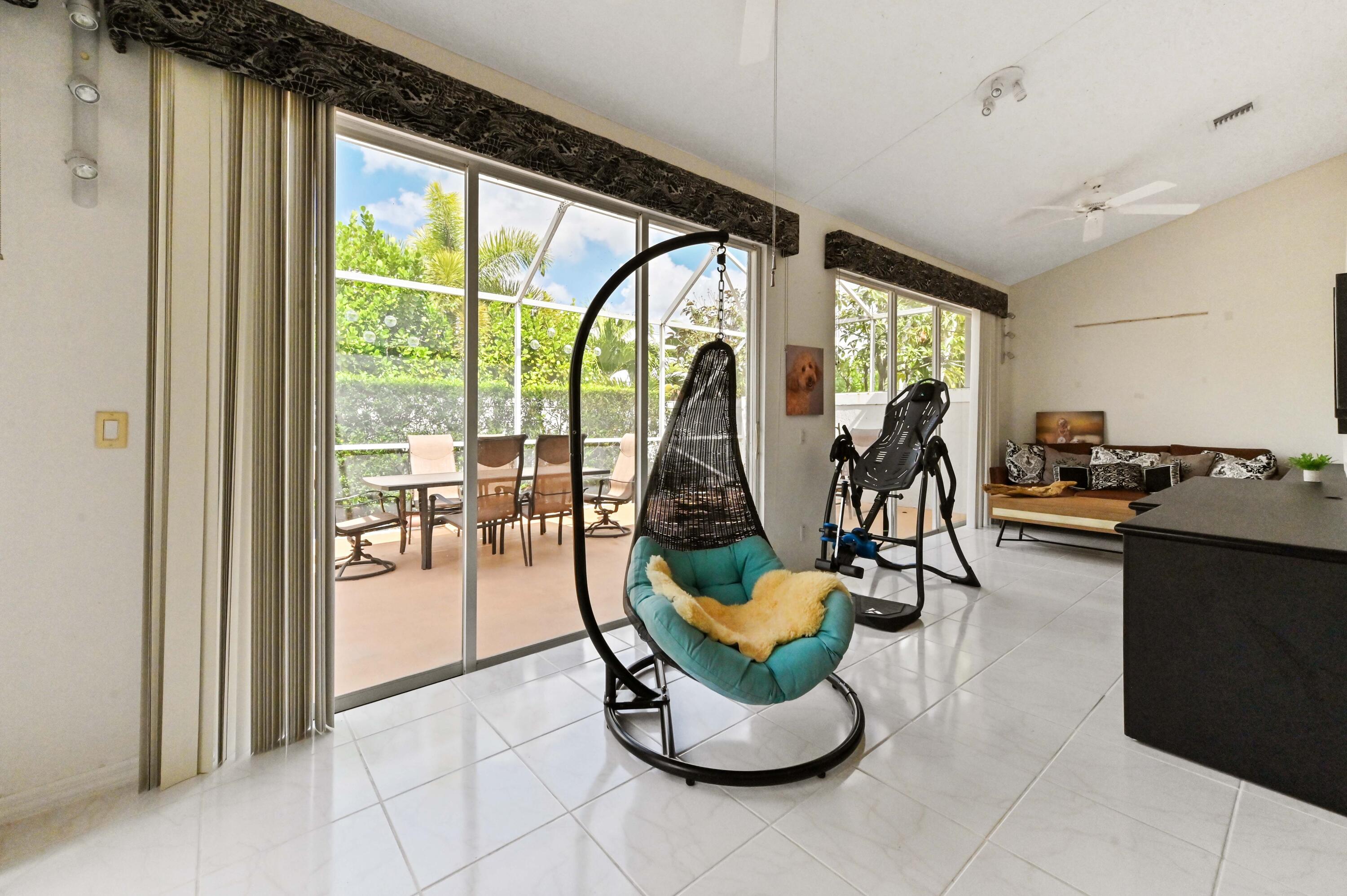 8319 Horseshoe Bay Road Boynton Beach, FL 33472 - Photo 18 of 69 a view of a living room and dining room