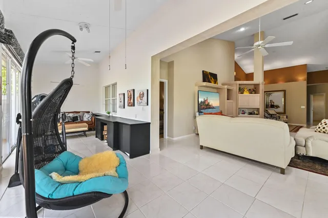 a bedroom with a bed and a lamp on table