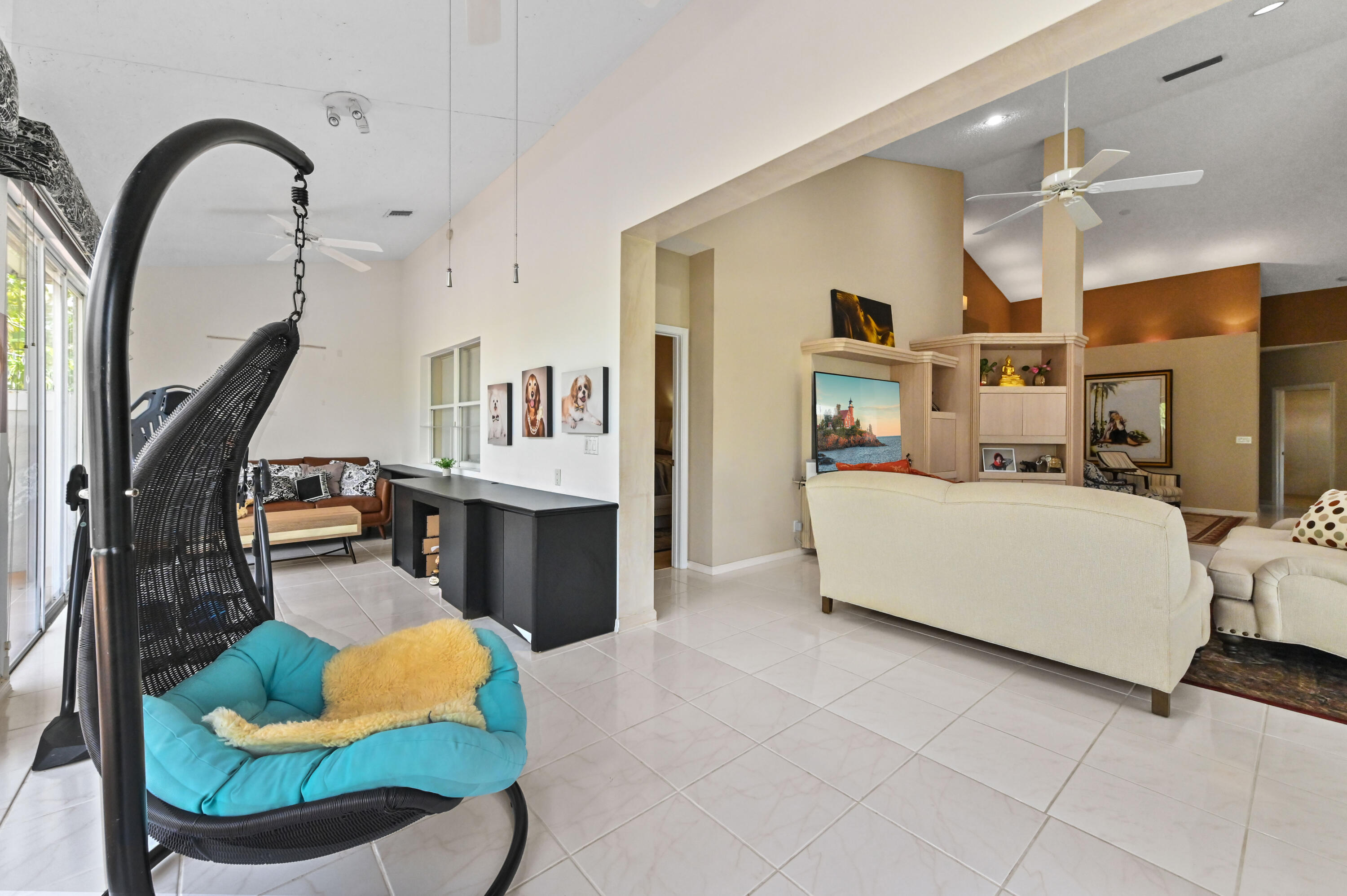 8319 Horseshoe Bay Road Boynton Beach, FL 33472 - Photo 19 of 69 a living room with furniture and a mirror