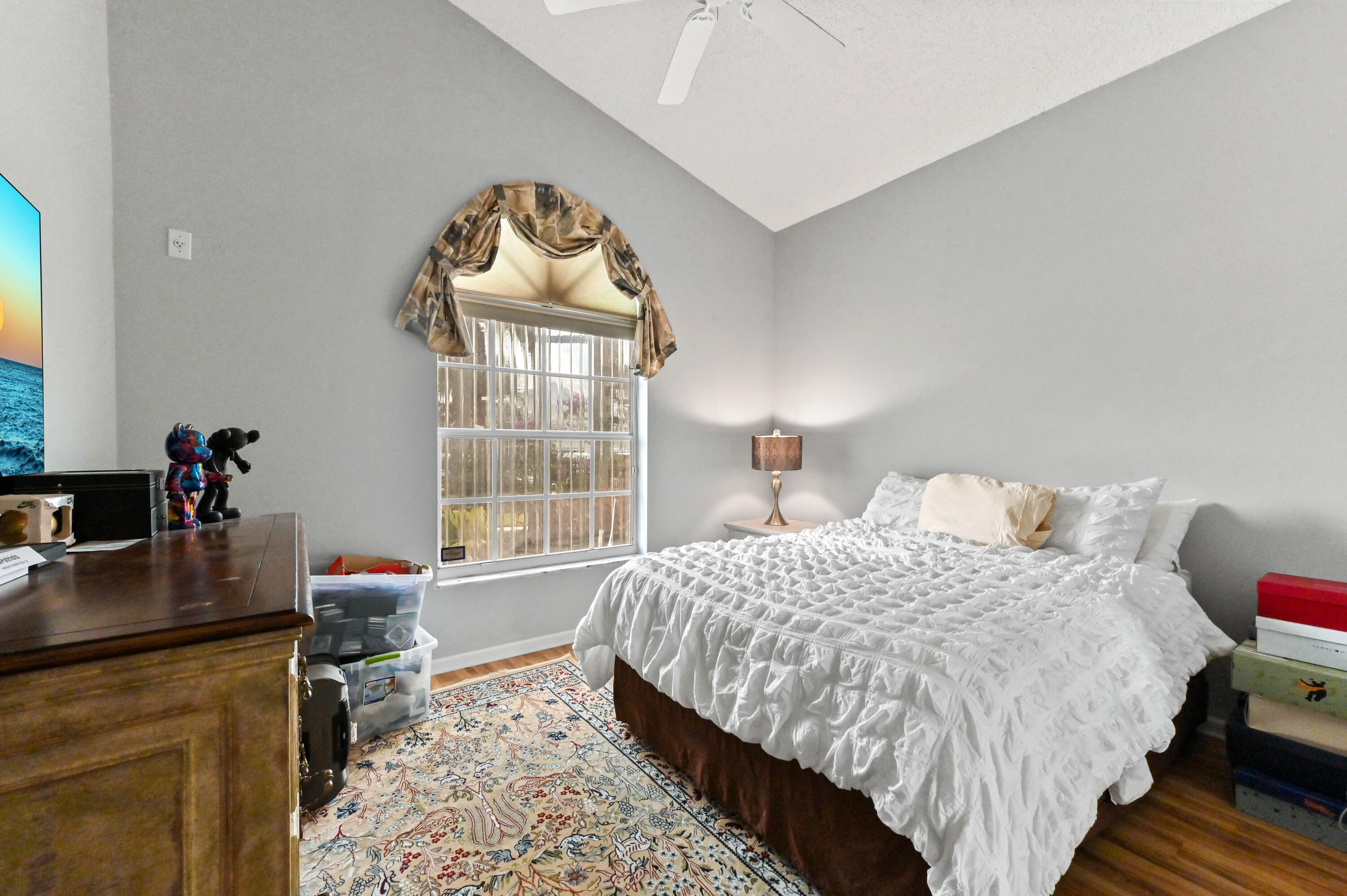 8319 Horseshoe Bay Road Boynton Beach, FL 33472 - Photo 23 of 69 a bedroom with a bed and a window