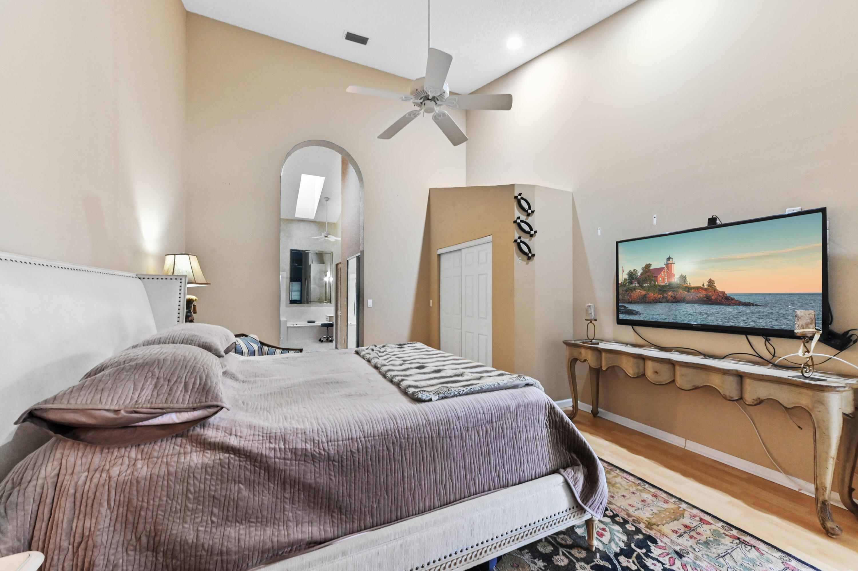 8319 Horseshoe Bay Road Boynton Beach, FL 33472 - Photo 27 of 69 a bedroom with a bed and a flat screen tv