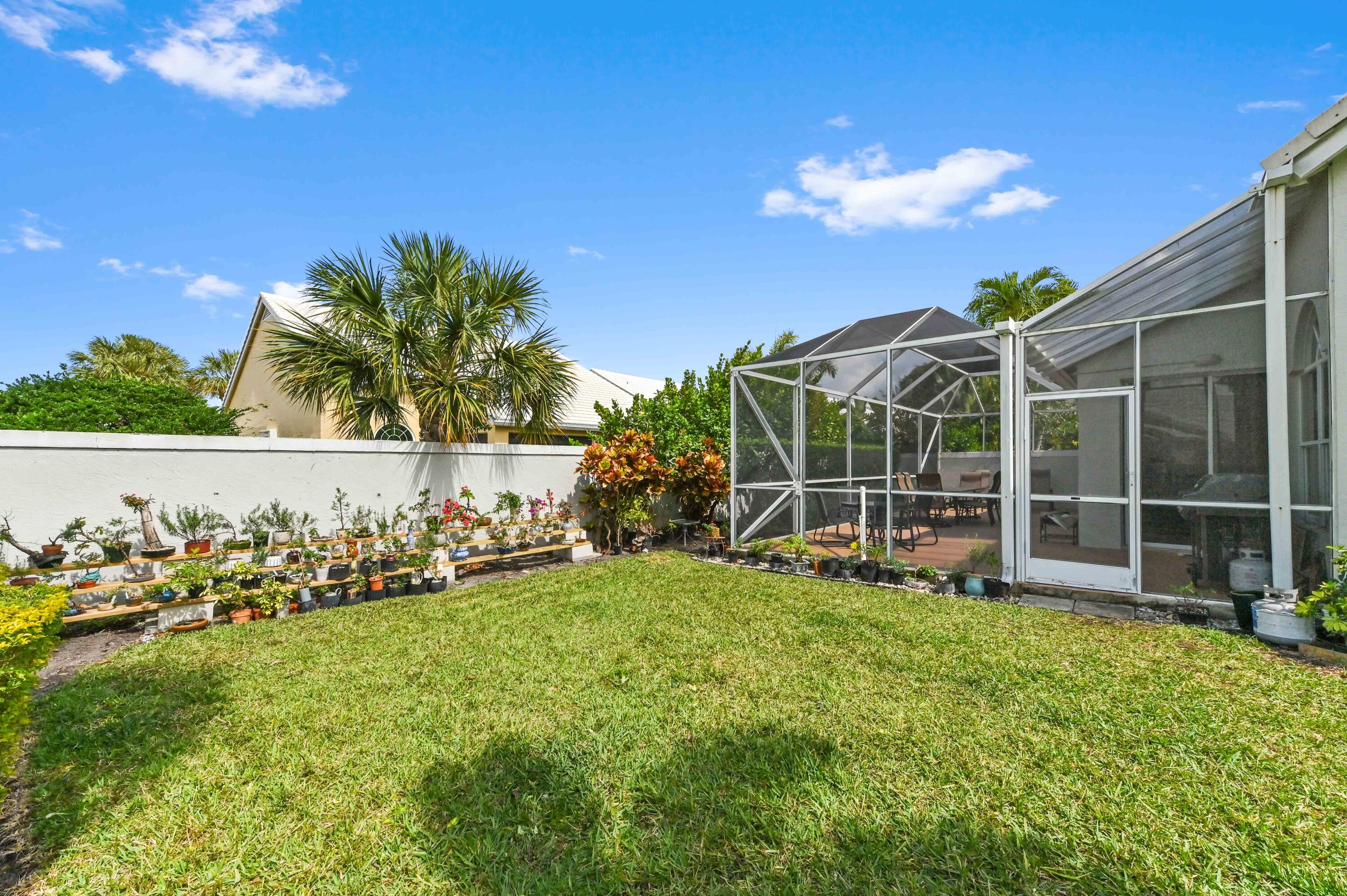8319 Horseshoe Bay Road Boynton Beach, FL 33472 - Photo 35 of 69 a view of a house with a yard