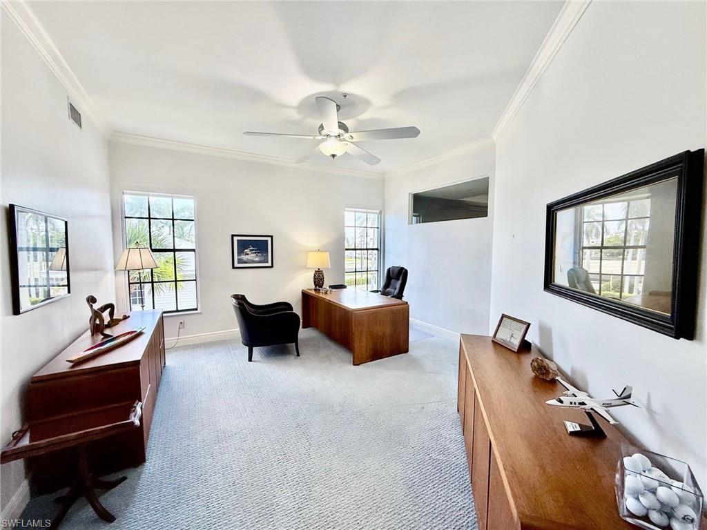 705 10th Street South, Unit 301 Naples, FL 34102 - Photo 20 of 35 a living room with furniture
