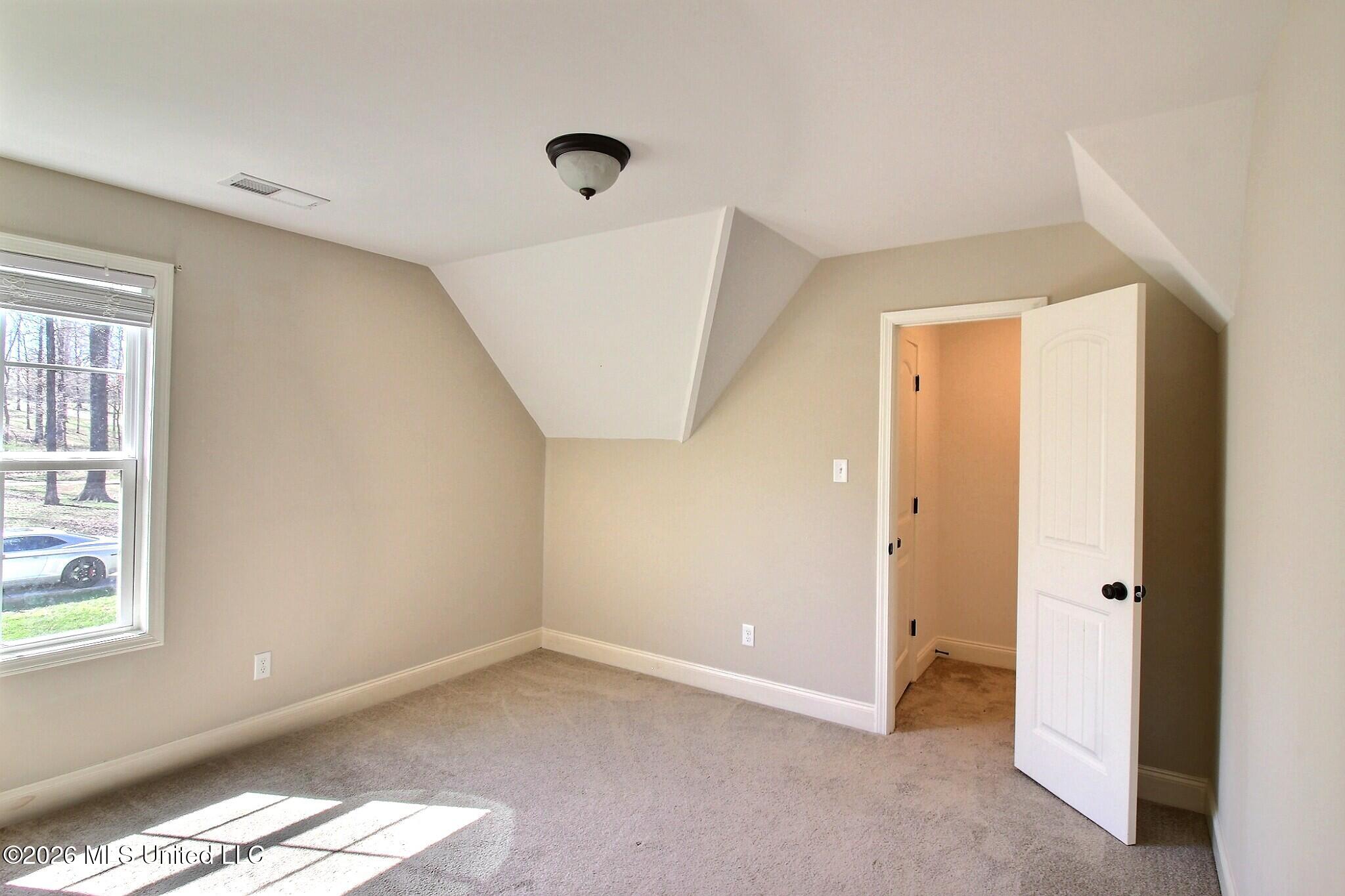 4722 Alexander Road Olive Branch, MS 38654 - Photo 13 of 18 Front Right Bedroom Up & Walk-In Closet