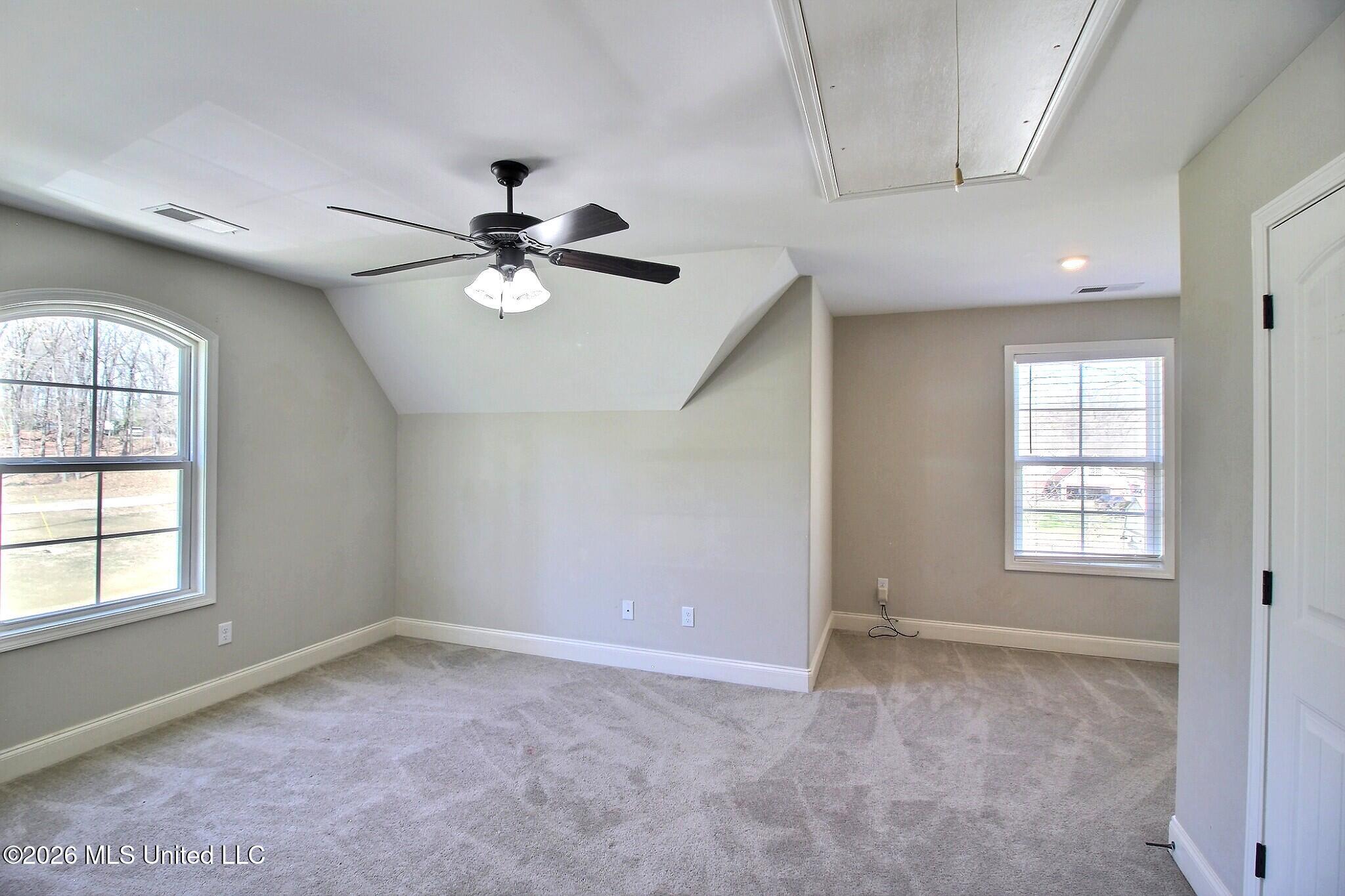 4722 Alexander Road Olive Branch, MS 38654 - Photo 16 of 18 Front Left Bedroom Up & Walk-In Closet