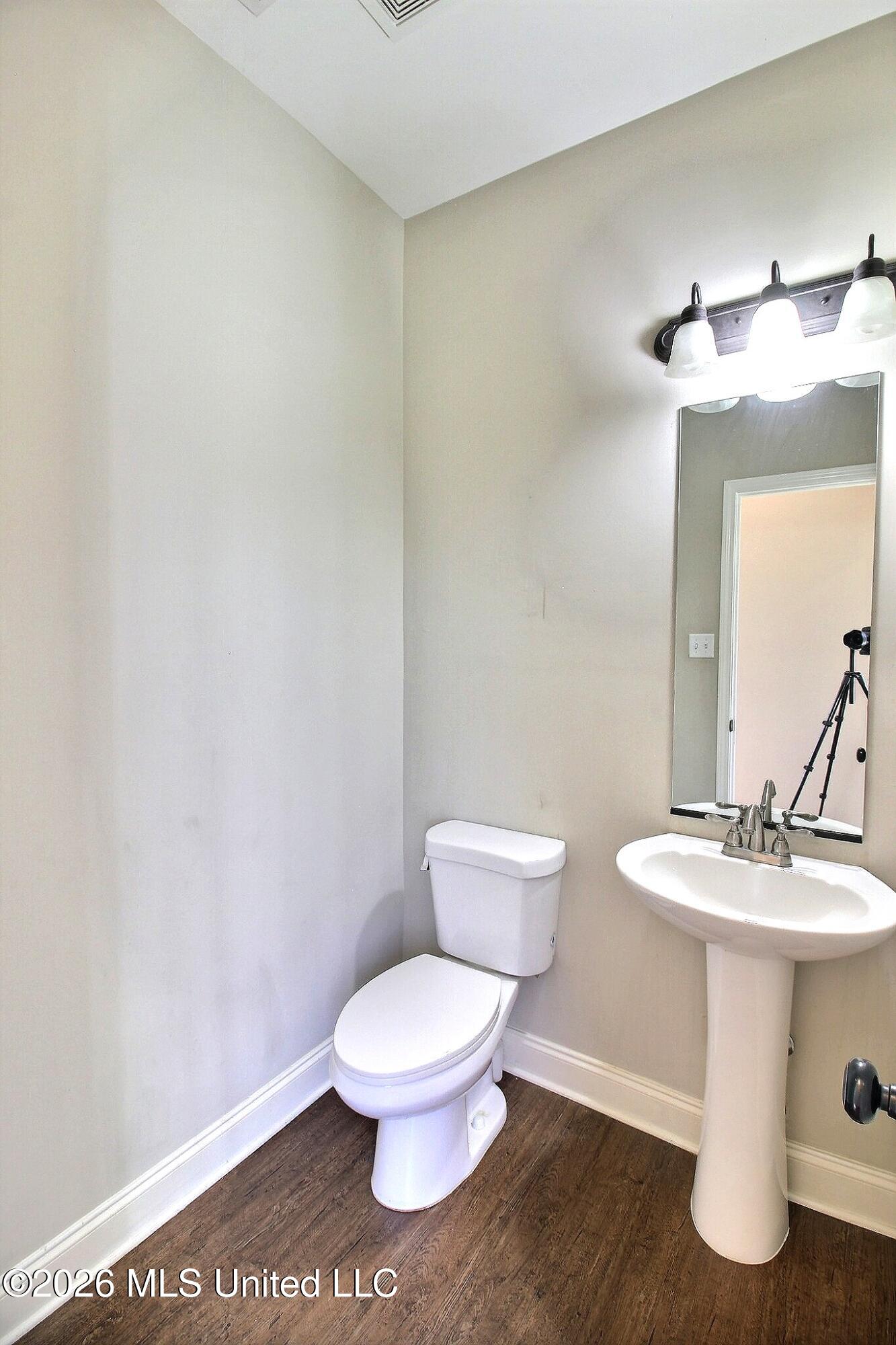 4722 Alexander Road Olive Branch, MS 38654 - Photo 9 of 18 Half Bath Off Laundry Room