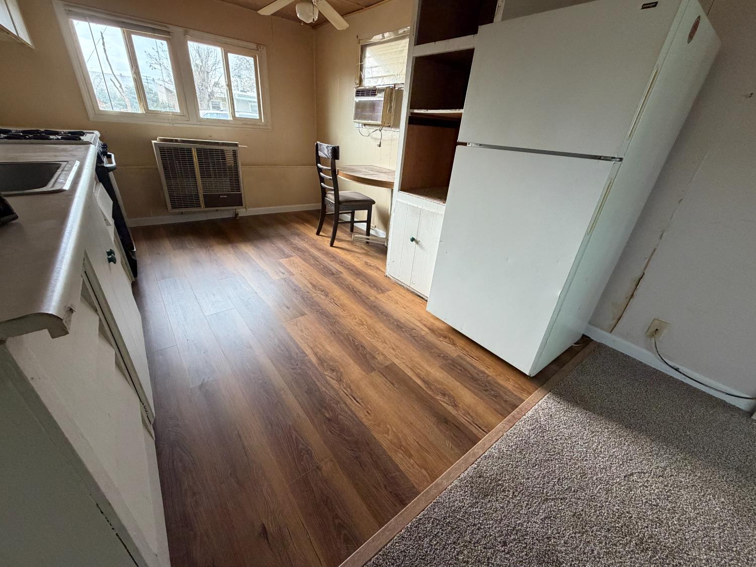 1450 Lake Avenue, Unit 6 Colusa, CA 95932 - Photo 5 of 8 a view of a livingroom with wooden floor and furniture