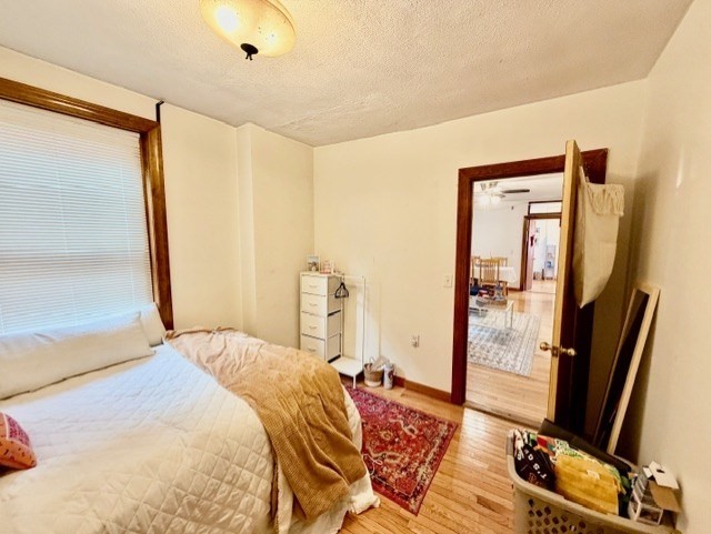 11 Foster Street, Unit 5 Boston, MA 02109 - Photo 19 of 19 a bedroom with a bed and a flat screen tv