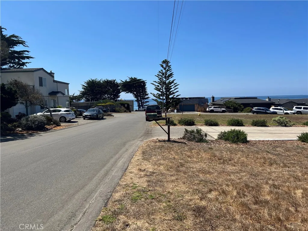 0 Wedgewood Street Cambria, CA 93428 - Photo 7 of 24 a view of a lake with houses