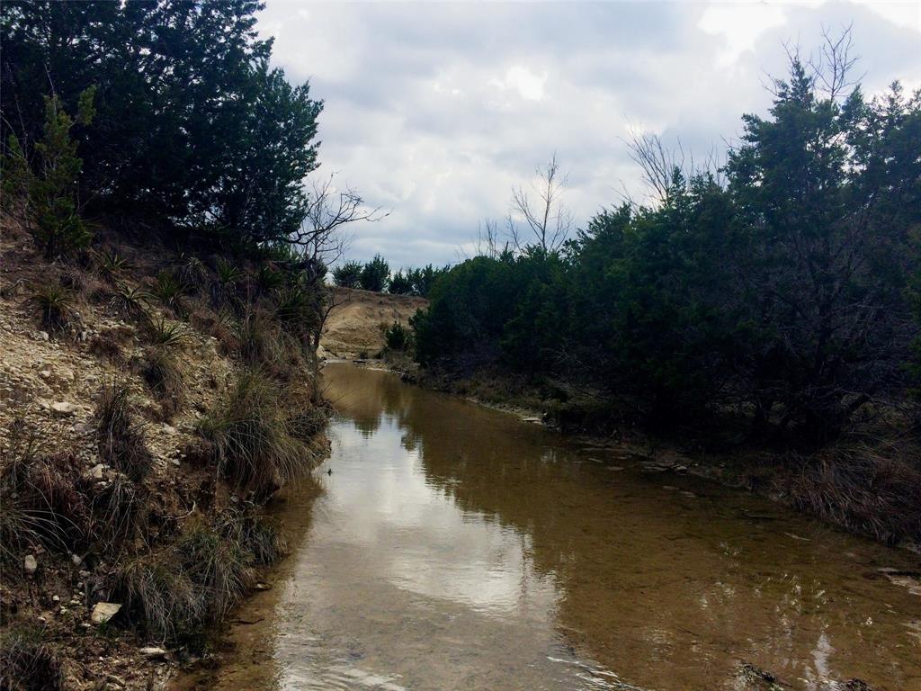2 County Road 208 Lampasas, TX 76550 - Photo 25 of 30 a view of a lake in middle of forest
