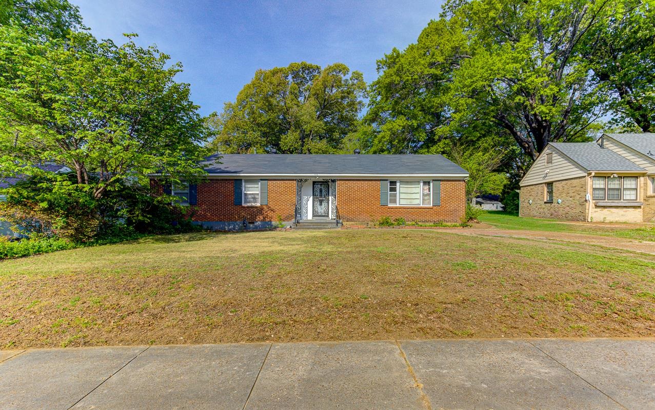 1019 Tatum Road Memphis, TN 38122 - Photo 16 of 21 Ranch-style home featuring a front yard and brick siding