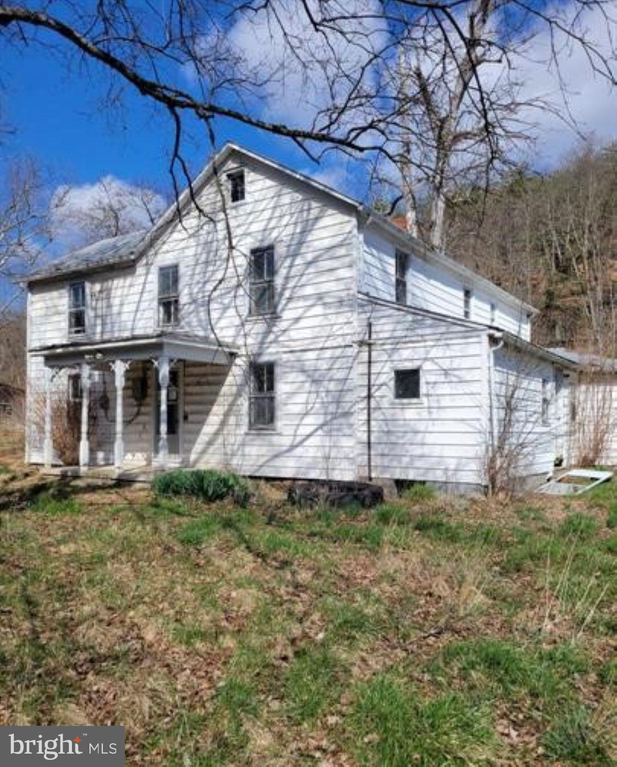 99 Little Cacapon Road Romney, WV 26757 - Photo 1 of 25 a view of a back yard of the house