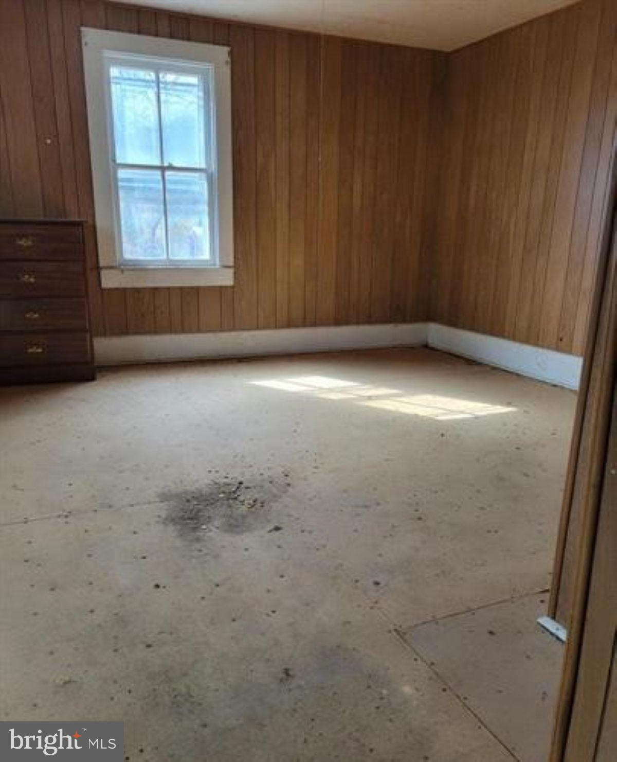 99 Little Cacapon Road Romney, WV 26757 - Photo 16 of 25 an empty room with a window