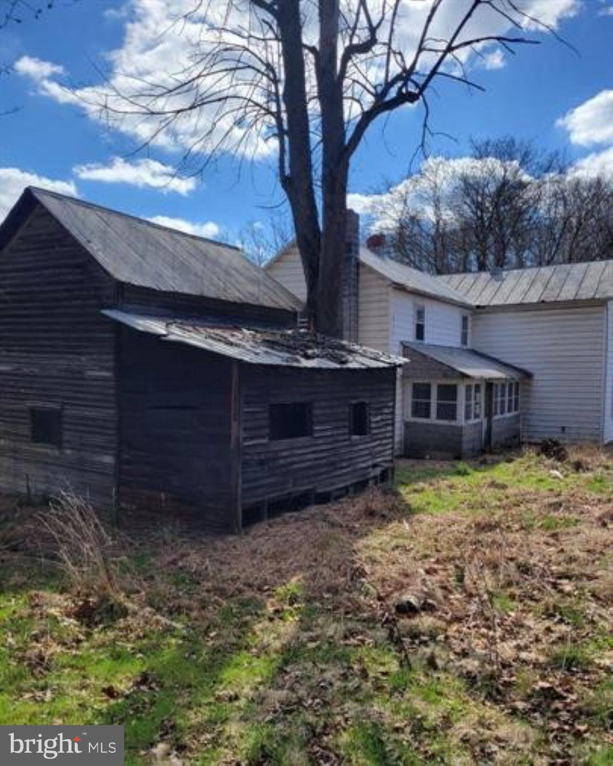 99 Little Cacapon Road Romney, WV 26757 - Photo 4 of 25 a view of a house with a yard