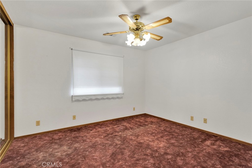 16224 Olalee Road Apple Valley, CA 92307 - Photo 19 of 48 an empty room with a window