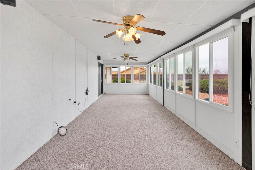 16224 Olalee Road Apple Valley, CA 92307 - Photo 31 of 48 a view of an empty room with a window