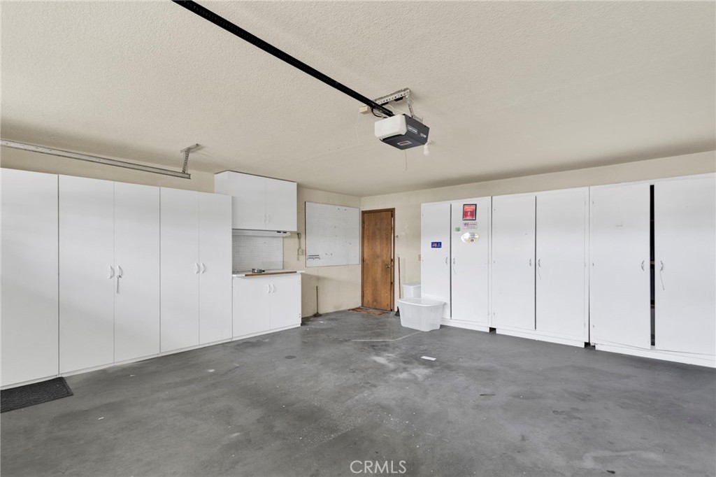 16224 Olalee Road Apple Valley, CA 92307 - Photo 33 of 48 a view of a garage