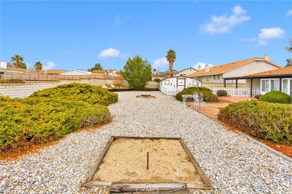 16224 Olalee Road Apple Valley, CA 92307 - Photo 37 of 48 a view of a swimming pool with an outdoor seating