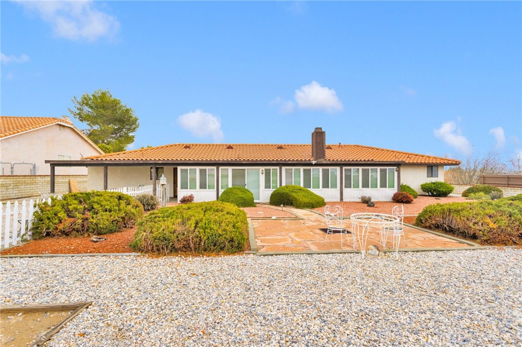 16224 Olalee Road Apple Valley, CA 92307 - Photo 39 of 48 a front view of a house with a yard