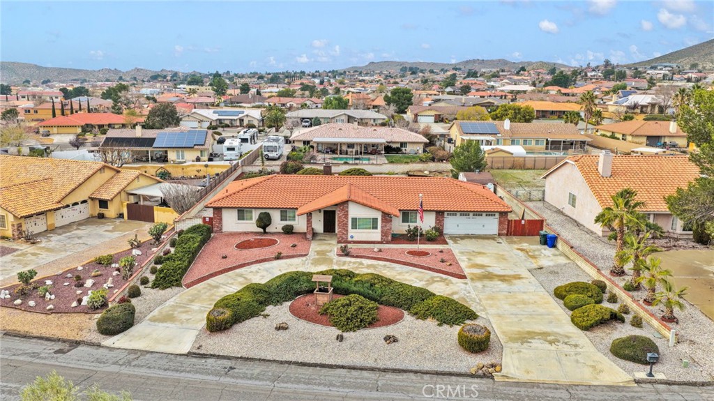 16224 Olalee Road Apple Valley, CA 92307 - Photo 47 of 48 an aerial view of residential houses with outdoor space