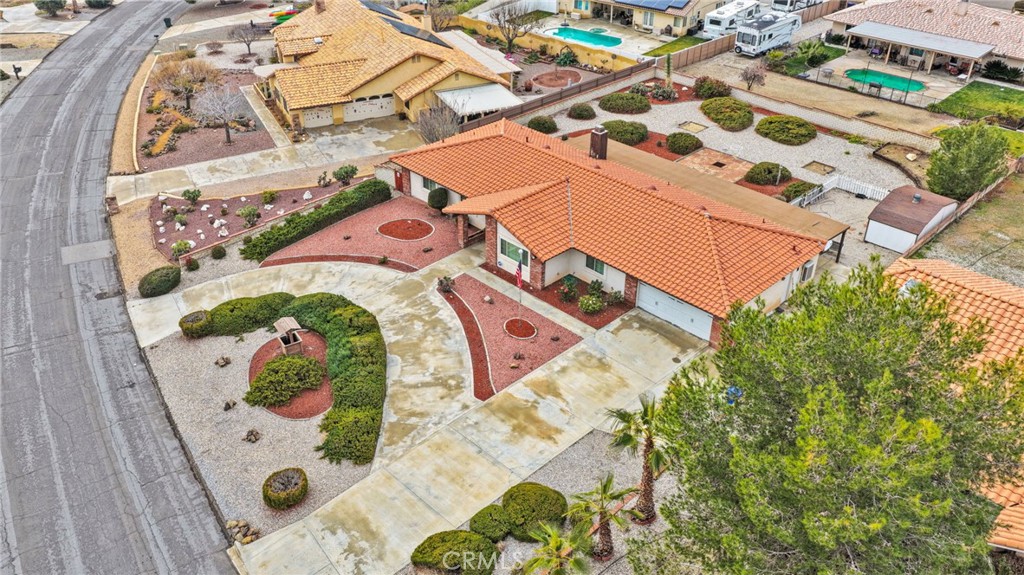 16224 Olalee Road Apple Valley, CA 92307 - Photo 48 of 48 an aerial view of a house with a swimming pool