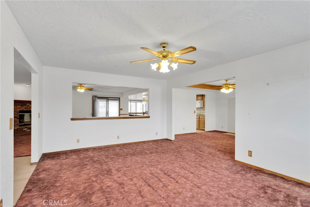 16224 Olalee Road Apple Valley, CA 92307 - Photo 7 of 48 a view of an empty room with a window