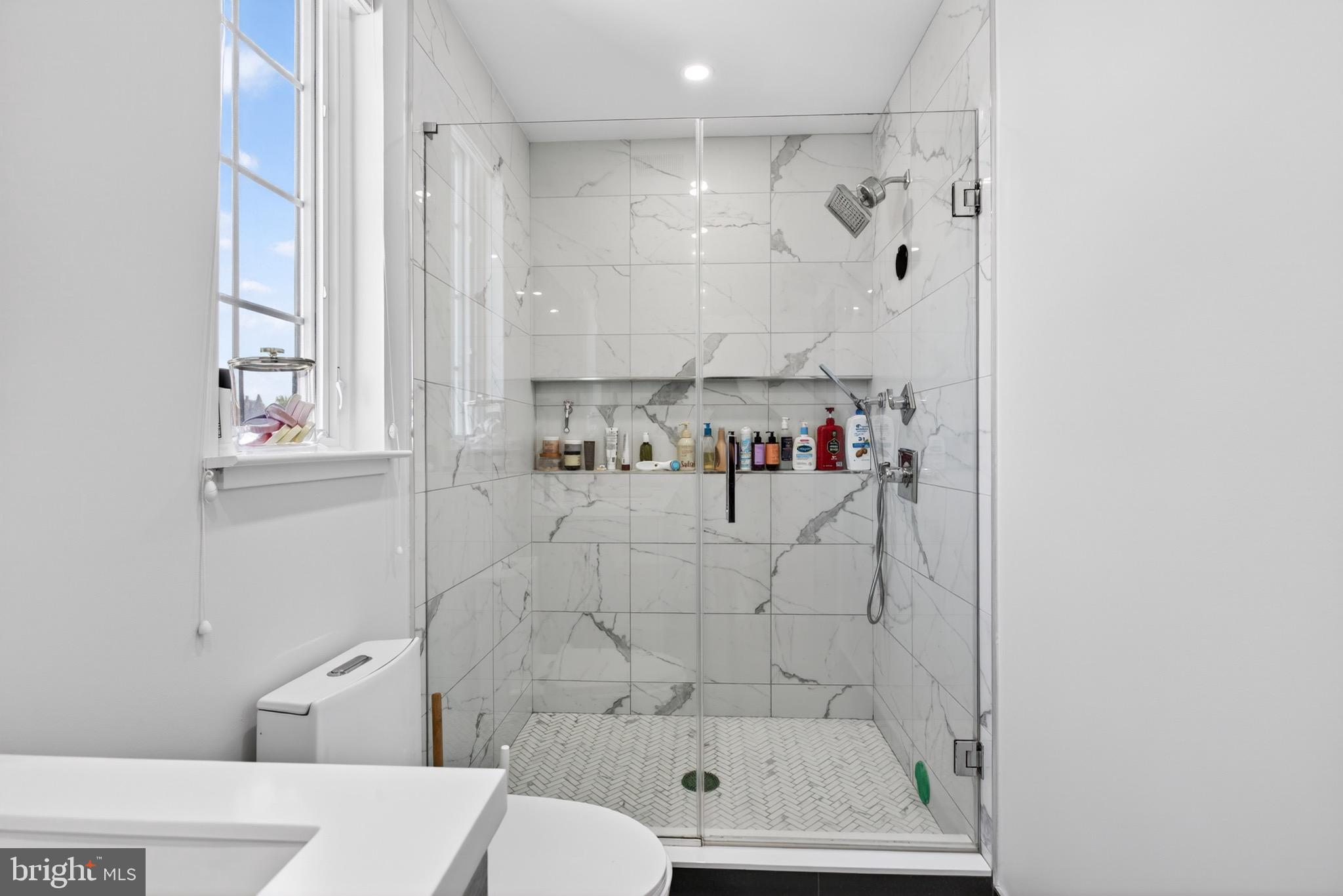 2411 Innovator Way Philadelphia, PA 19146 - Photo 19 of 26 a bathroom with a shower and a toilet