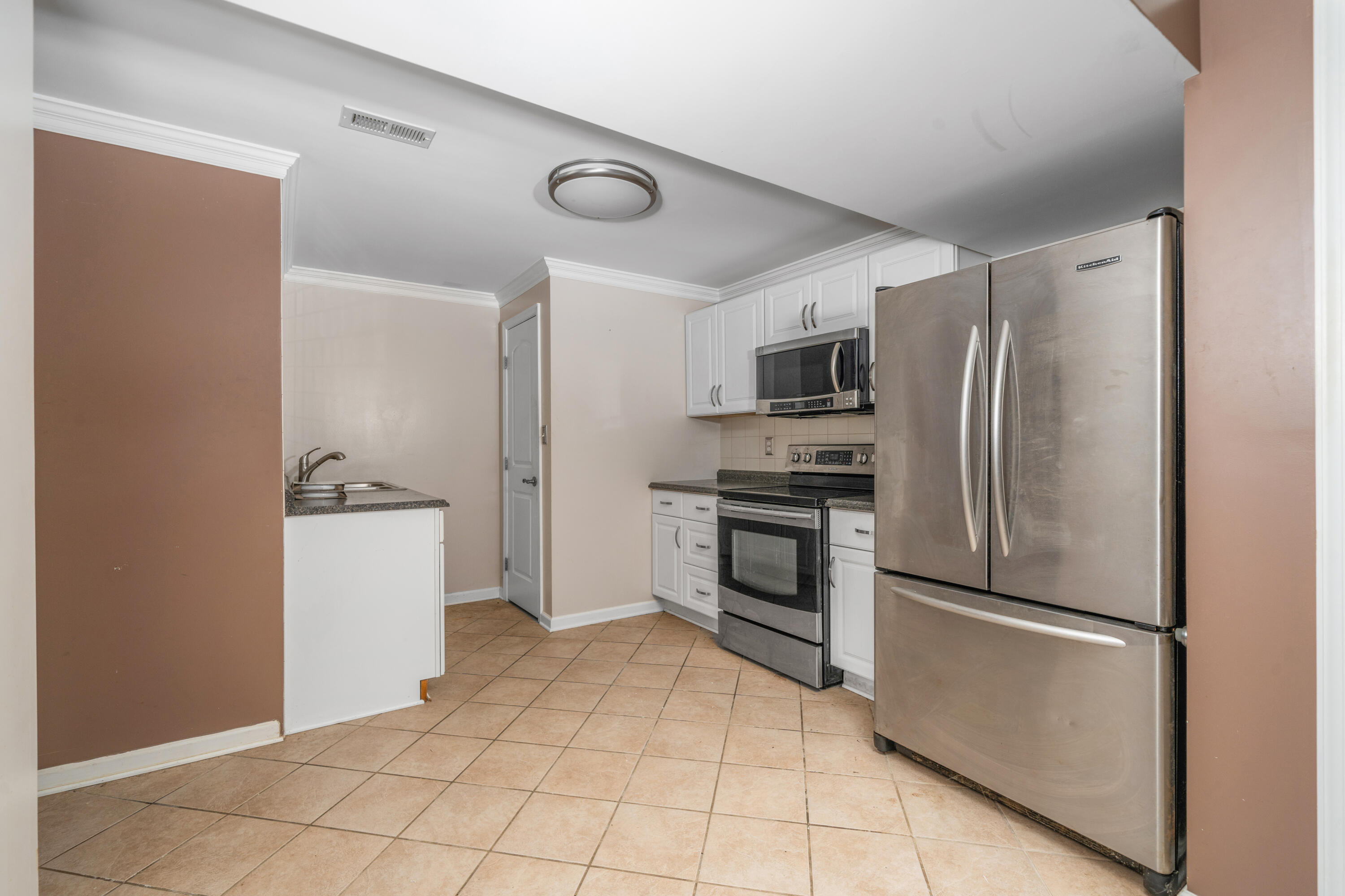 765 Country Club Road Troutville, VA 24175 - Photo 27 of 29 a kitchen with a refrigerator sink and stove