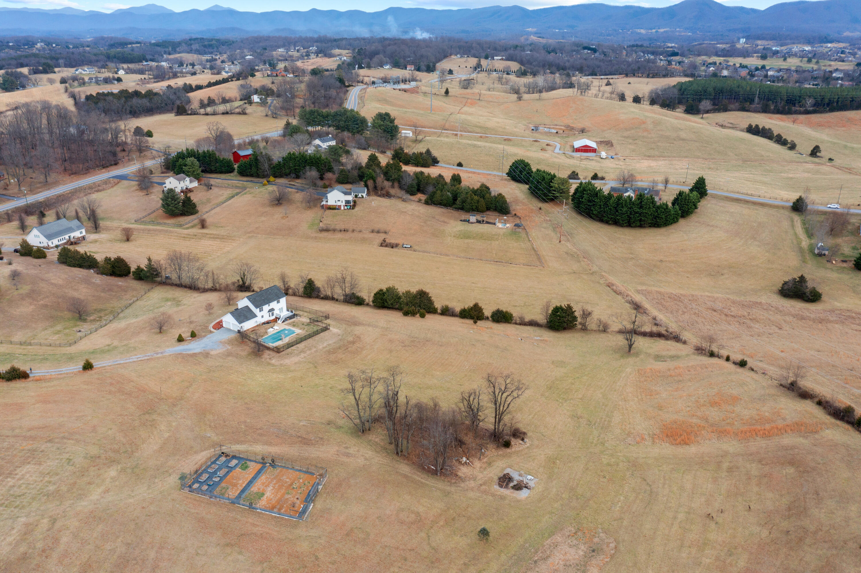 765 Country Club Road Troutville, VA 24175 - Photo 5 of 29 an aerial view of a swimming pool and mountain view