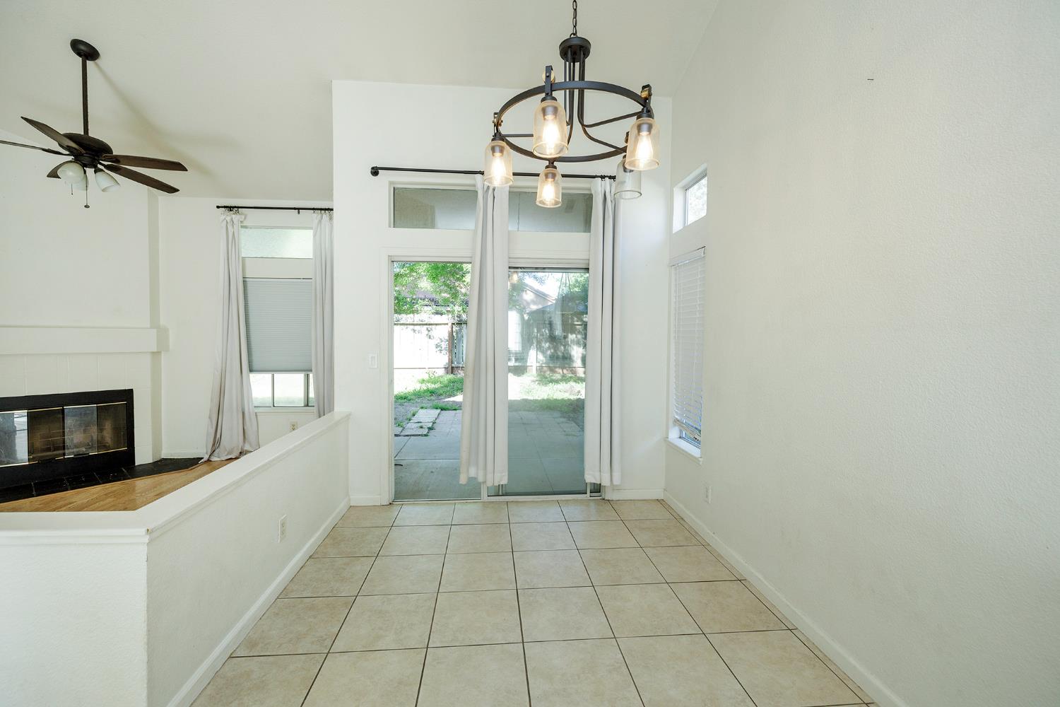 4093 Heartland Way Turlock, CA 95382 - Photo 11 of 43 a view of an entryway with a chandelier