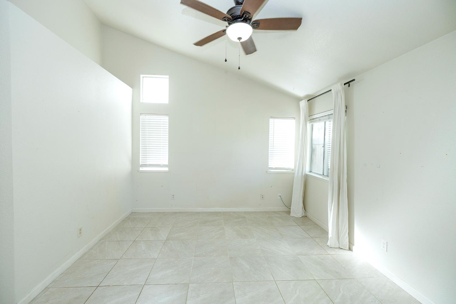 4093 Heartland Way Turlock, CA 95382 - Photo 20 of 43 a view of an empty room with a window