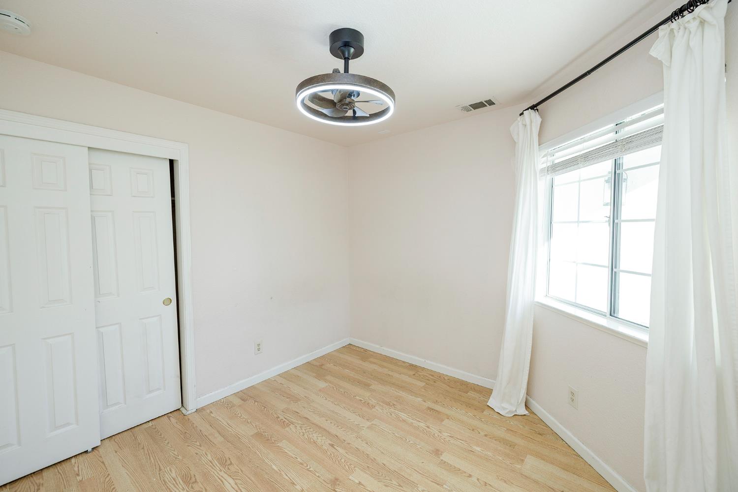 4093 Heartland Way Turlock, CA 95382 - Photo 30 of 43 an empty room with a window