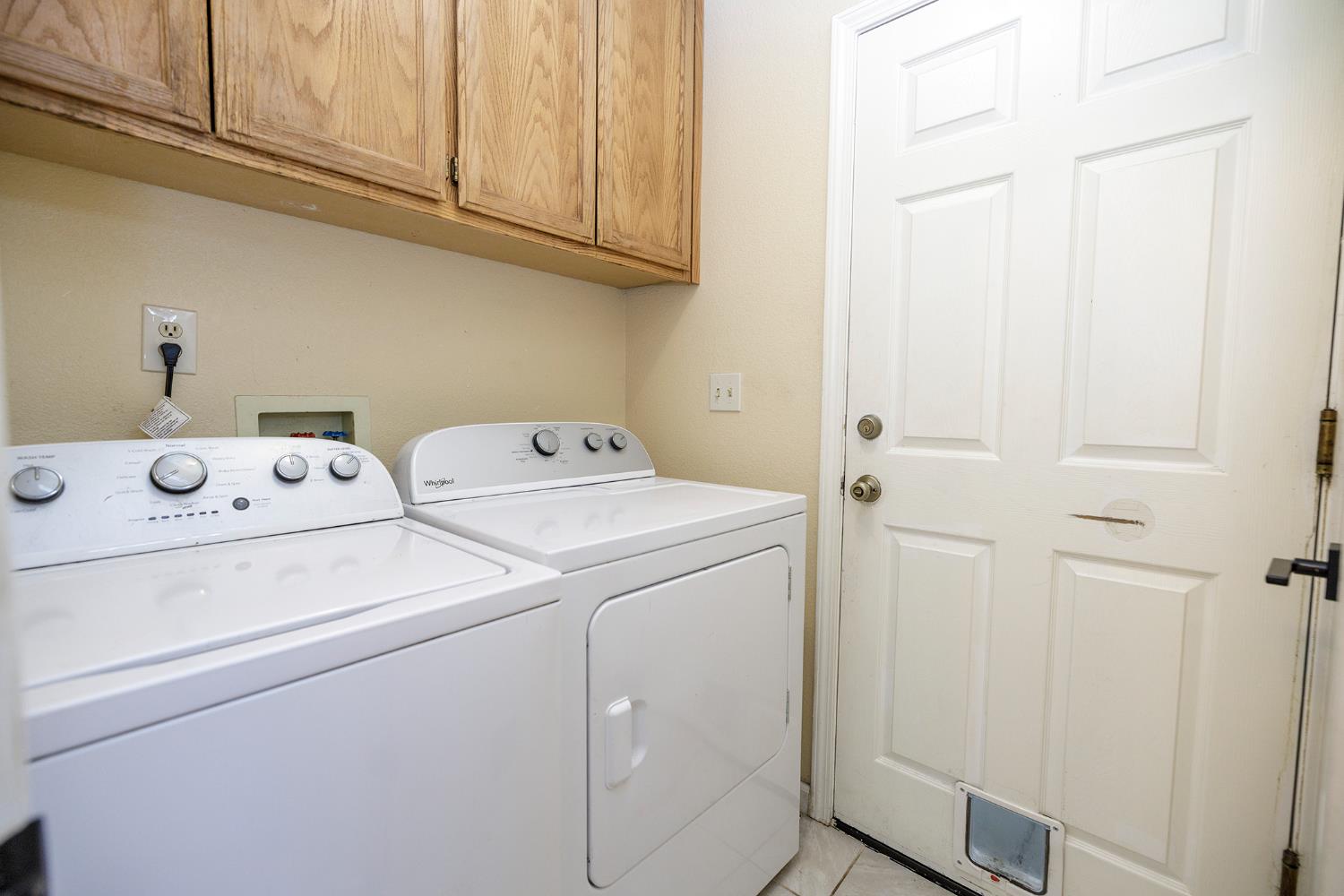 4093 Heartland Way Turlock, CA 95382 - Photo 32 of 43 a utility room with dryer and washer