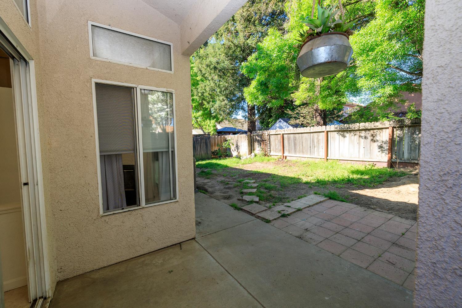 4093 Heartland Way Turlock, CA 95382 - Photo 34 of 43 a view of a backyard with a garden