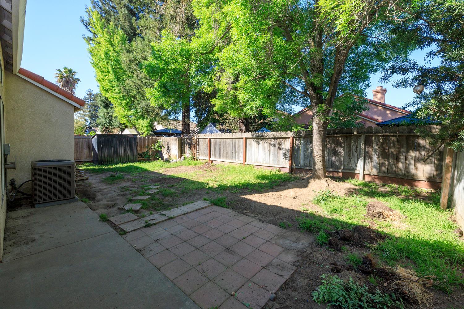 4093 Heartland Way Turlock, CA 95382 - Photo 36 of 43 a view of backyard of house with green space