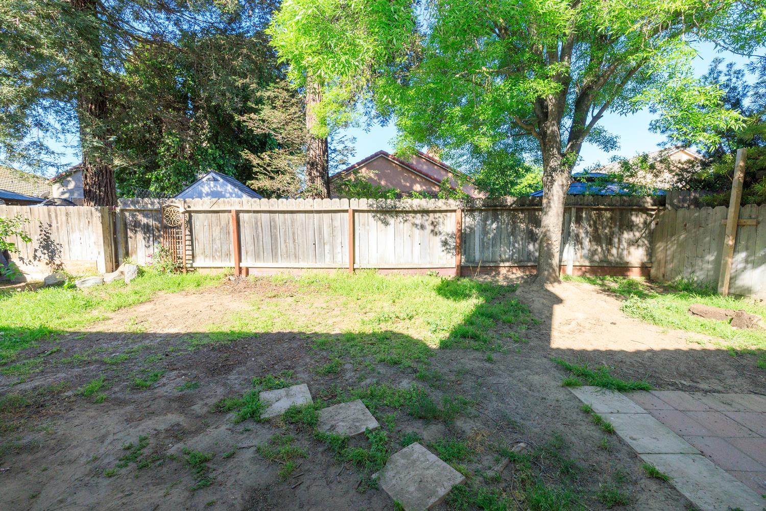 4093 Heartland Way Turlock, CA 95382 - Photo 42 of 43 a view of backyard of house with green space