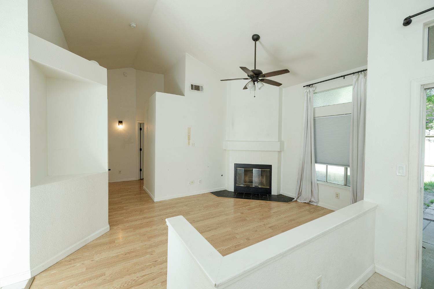 4093 Heartland Way Turlock, CA 95382 - Photo 7 of 43 a view of empty room with a fireplace
