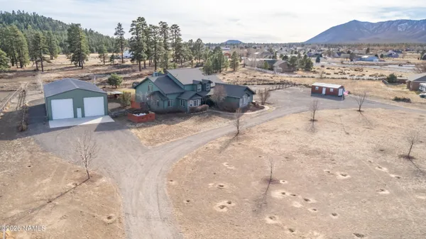 a view of a house with a mountain