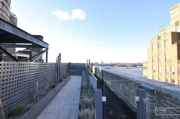 a view of a terrace with seating area